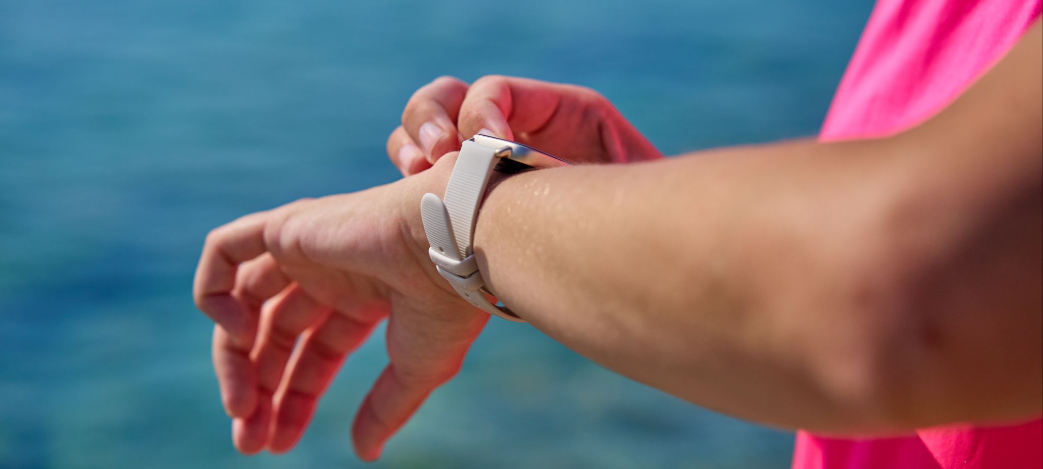 checking watch by sea